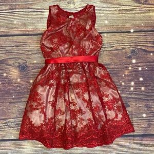 Teeze Me red Fit & flare dress w lace overlay and a ribbon belt. Size 7. EUC.